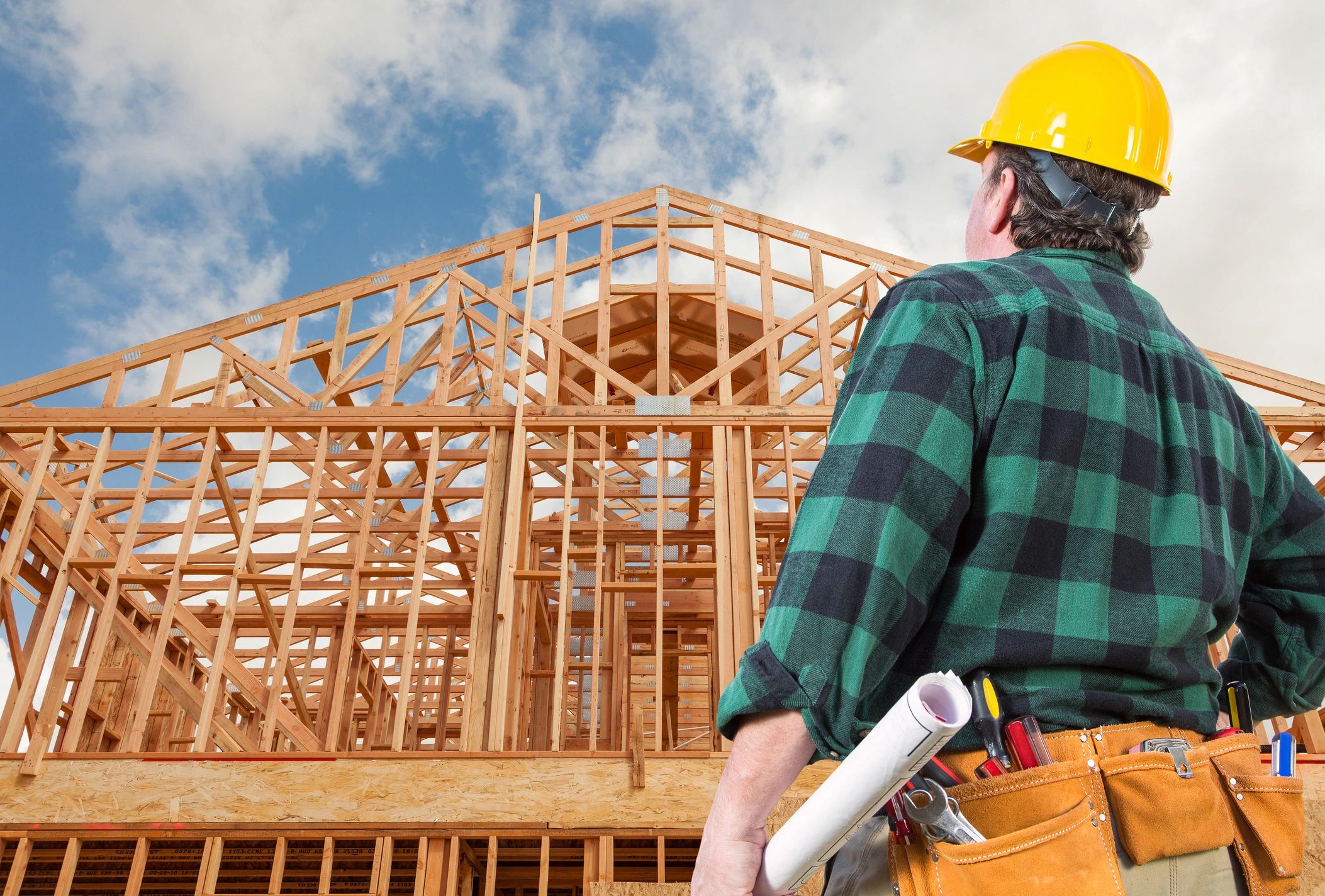Contractor Wearing Hard Hat Standing In Front of
